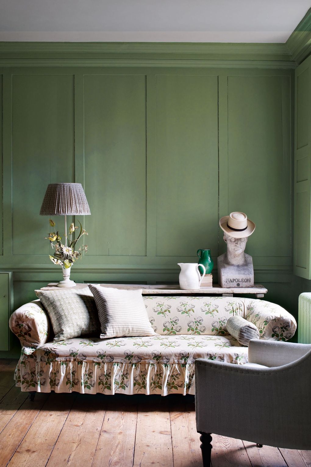 Farrow and Ball Breakfast Room Green Walls Slipcovered Sofa Ruffled Skirt Colefax and Folwer Bowood Print