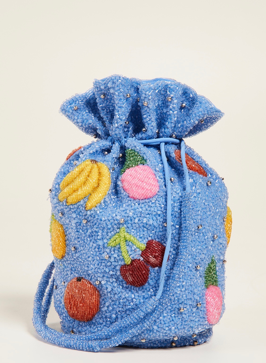 Blue beaded fruit bucket bag by Ganni