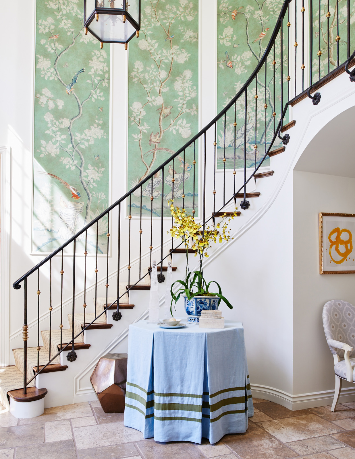 Mark D Sikes Foyer Skirted Table Pleated Octagonal Chinoiserie Wallpaper Panels Iron Staircase