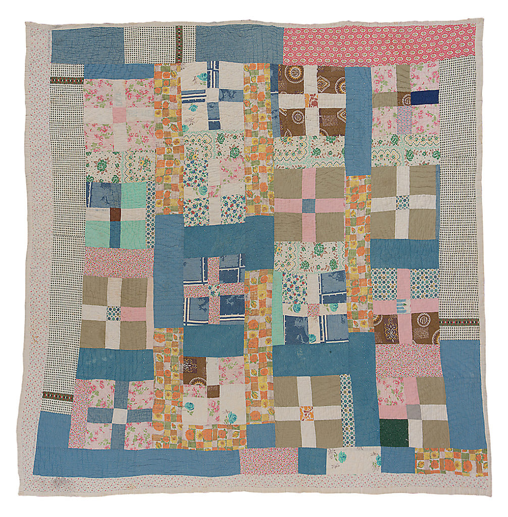 Hand-stitched quilt from Gee's Bend, Alabama. Cross in block.