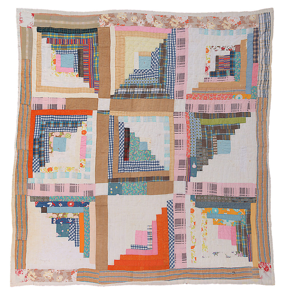 Hand-stitched quilt from Gee's Bend, Alabama. Log cabin nine block.
