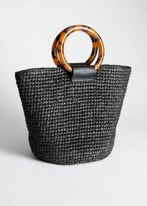 black round woven bag
