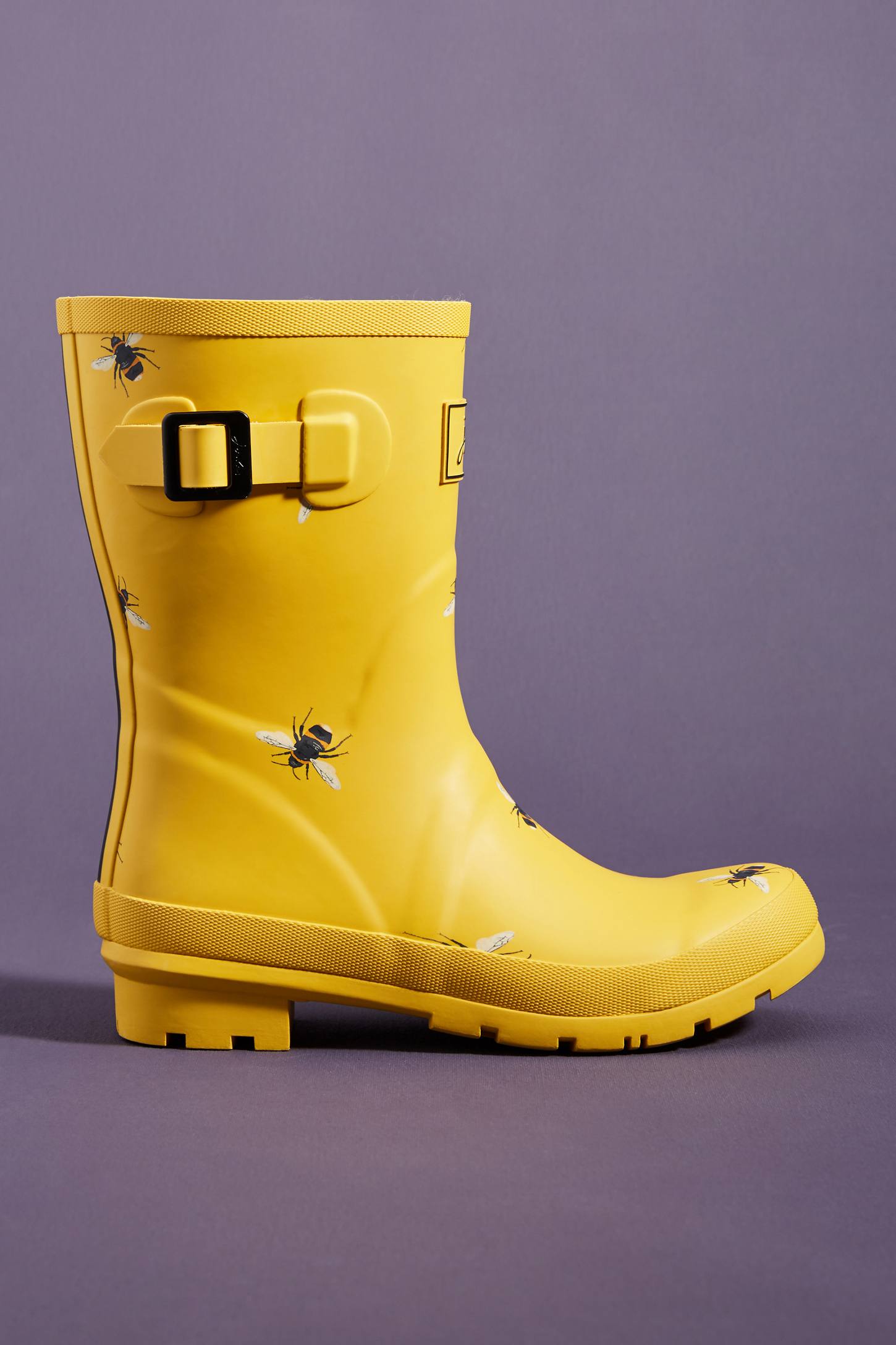 yellow rain boots with bees